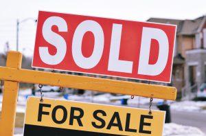 Sold and For Sale Sign