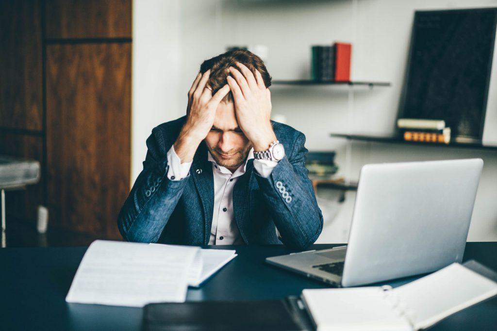 Is the appraisal industry doomed? An appraiser despairs at his desk.